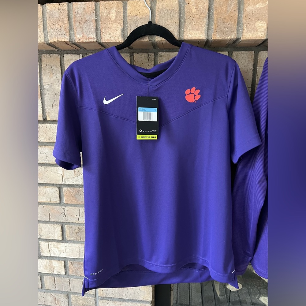 Purple Nike short sleeve with orange paw 🐾 print